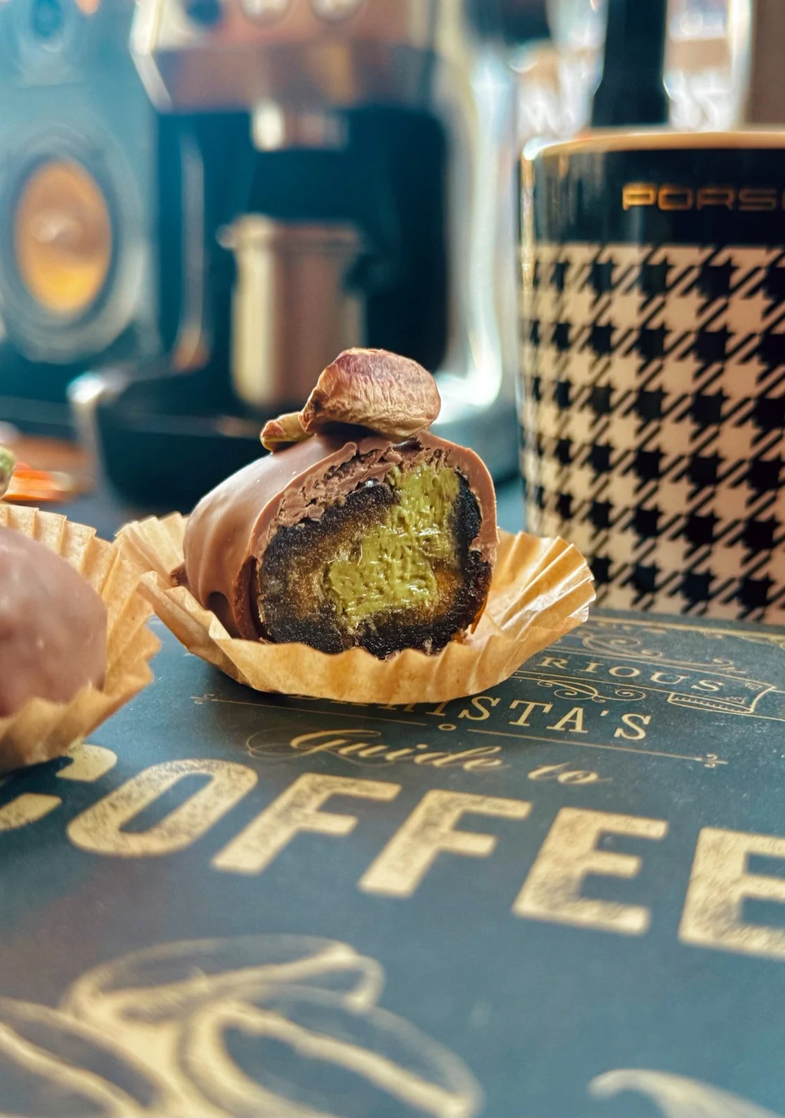 Handmade chocolate dates in production